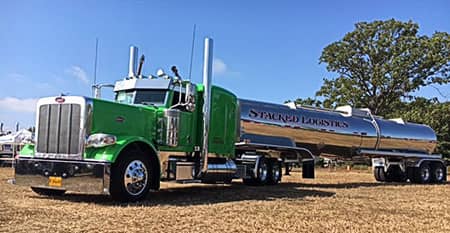 Green truck with silver tank